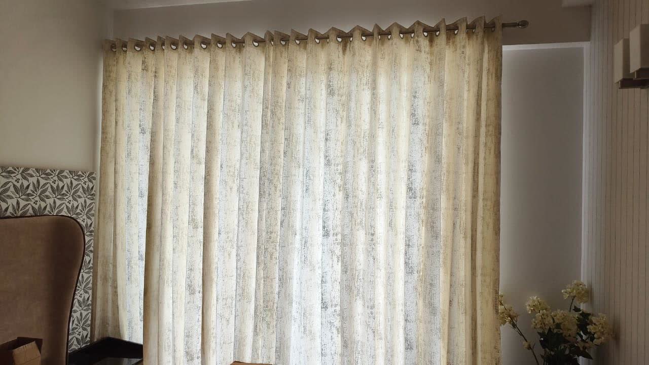 Cream eyelet curtains
